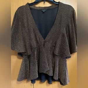 Shimmering gold women’s blouse by Guess in size L.